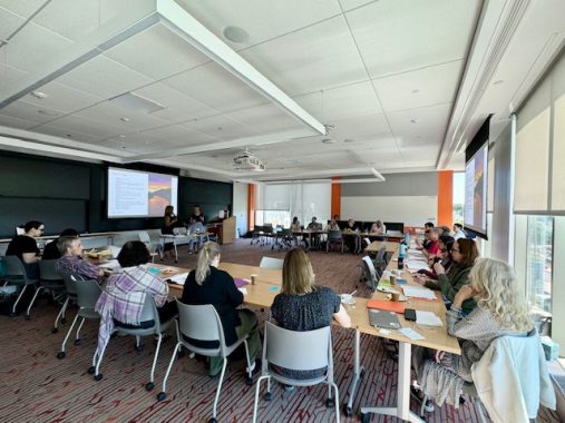 A group of students attends a workshop dedicated to institutional inclusive excellence.